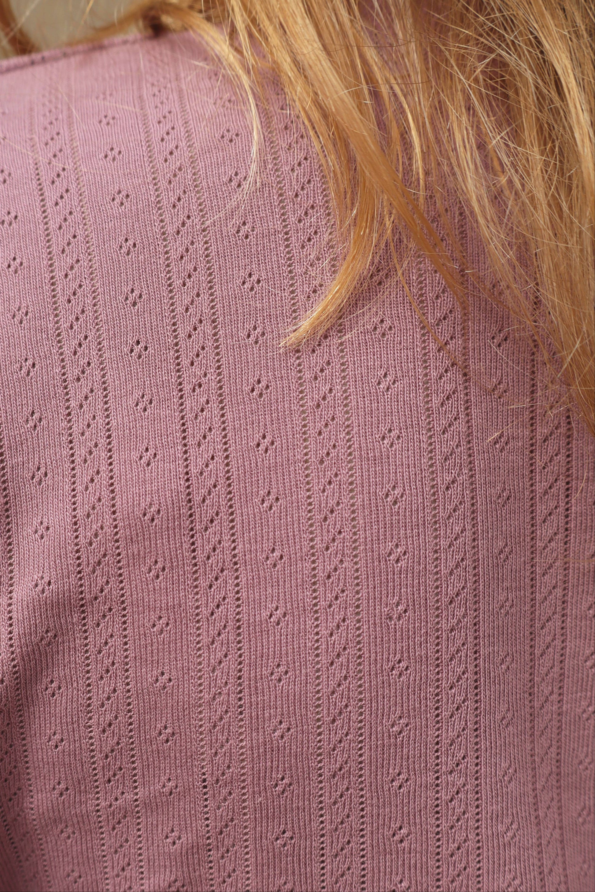 Purple pointelle close up of top