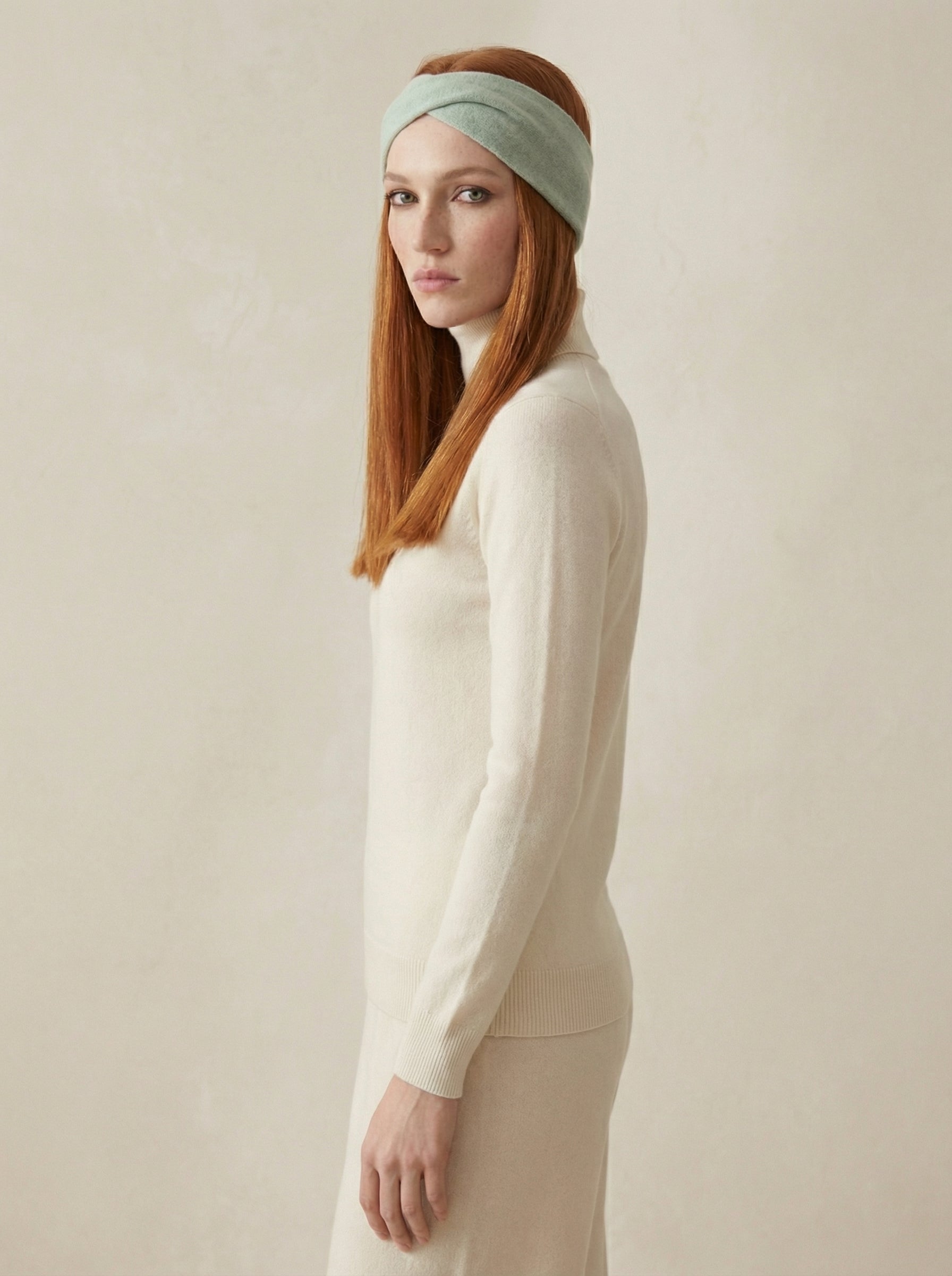 feminine winter outfit with mint green cashmere headband